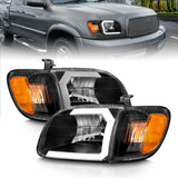 ANZO 00-04 Toyota Tundra (Fits Reg/Acc Cab Only) Crystal Headlights w/Light Bar Black w/Corner Light - 111579