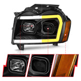 ANZO 2005-2007 Jeep Grand Cherokee Projector Headlights w/ Light Bar Switchback Black Housing - 111543