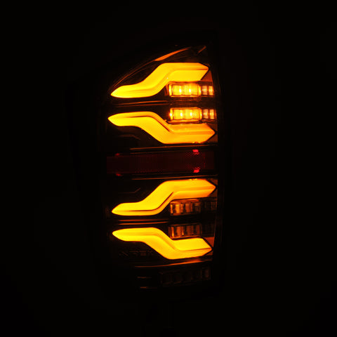 AlphaRex 16-21 Toyota Tacoma LUXX LED Taillights Alpha Blk w/Activ Light/Seq Signal - 680080