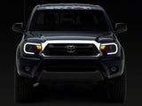 Raxiom 12-15 Toyota Tacoma Axial Series Headlights w/ LED Bar- Blk Housing (Clear Lens) - TT21847