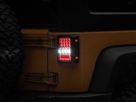 Raxiom 07-18 Jeep Wrangler JK Axial Series Lux LED Tail Lights- Blk Housing (Clear Lens) - J141596
