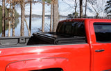 Lund 04-06 Chevy Silverado 1500 Fleetside (5.8ft. Bed) Hard Fold Tonneau Cover - Black - 969151