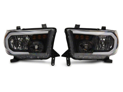 Raxiom 07-13 Toyota Tundra Axial Series Headlights w/ LED Bar- Blk Housing (Clear Lens) - TU16004