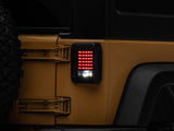 Raxiom 07-18 Jeep Wrangler JK LED Tail Lights- Black Housing (Smoked Lens) - J115435