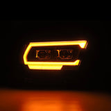 AlphaRex 19-22 Dodge Ram 1500 PRO-Series Projector Headlights Black w/Seq Signal/DRL - 880574