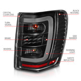 ANZO 1999-2004 Jeep Grand Cherokee LED Tail Lights w/ Light Bar Black Housing Clear Lens - 311394