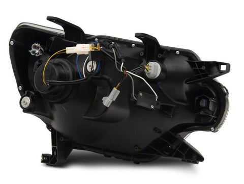 Raxiom 12-15 Toyota Tacoma Axial Projector Headlights w/ SEQL LED Bar- Blk Housing (Clear Lens) - TT21850