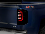 Raxiom 14-18 Chevrolet Silverado 1500 Axial Series LED Tail Lights- Blk Housing (Smoked Lens) - S151298