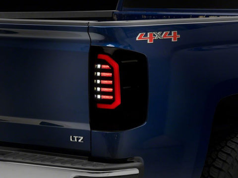 Raxiom 14-18 Chevrolet Silverado 1500 Axial Series LED Tail Lights- Blk Housing (Smoked Lens) - S151298