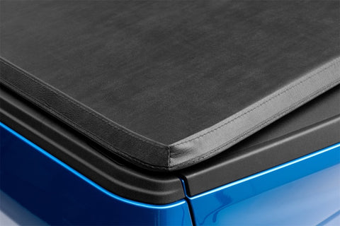 Lund 99-17 Ford F-250 Super Duty (6.5ft. Bed) Genesis Tri-Fold Tonneau Cover - Black - 95050