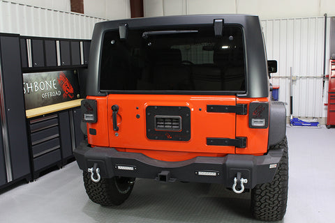 Fishbone Offroad 07-18 Jeep Wrangler JK - Black Textured Powdercoat Tail Light Covers - FB31043