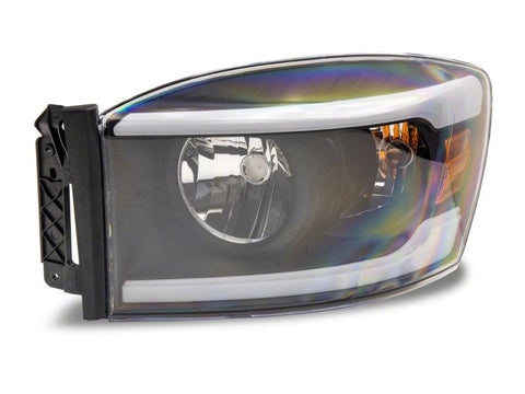 Raxiom 06-09 Dodge RAM 1500/2500/3500 Axial Headlights w/ SEQL LED Bar- Blk Housing (Clear Lens) - R131480