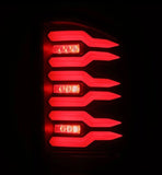 AlphaRex 07-14 Chevrolet Silverado 1500/2500HD/3500HD Luxx-Series LED Tail Lights Blk w/Smoked Lens - 620080