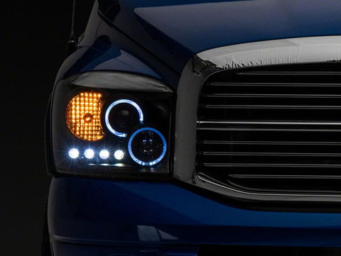 Raxiom 06-08 Dodge RAM 1500 LED Halo Projector Headlights- Blk Housing (Clear Lens) - R110149
