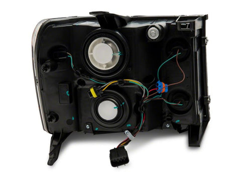 Raxiom 07-14 GMC Sierra 1500/2500 HD/3500 HD Axial OEM Rep Headlights- Chrome Housing (Clear Lens) - S518298