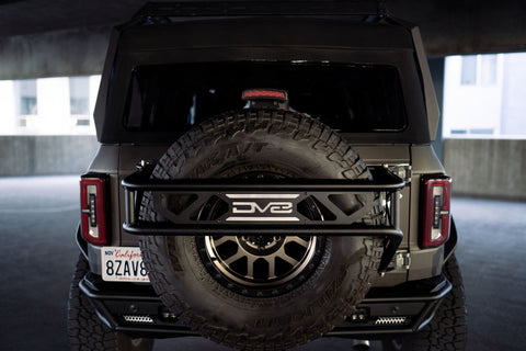 DV8 Offroad 21-23 Ford Bronco Spare Tire Guard & Accessory Mount - TCBR-01