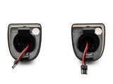 Raxiom 01-13 Chevrolet Silverado/GMC Sierra 1500 Axial Series LED License Plate Lamps- Smoked - S122507