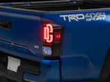 Raxiom 16-23 Toyota Tacoma XW Series Sequential LED Tail Lights- Black Housing- Clear Lens - TT30331