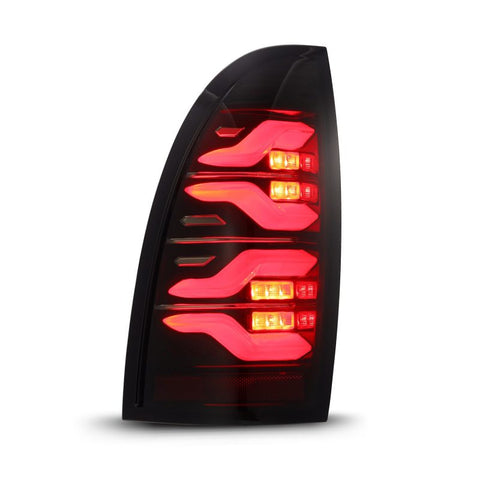 AlphaRex 05-15 Toyota Tacoma LUXX LED Taillights Blk/Red w/Activ Light/Seq Signal - 680070