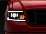 Raxiom 04-08 Ford F-150 Axial Series Projector Headlights with LED Bar- Black Housing- Clear Lens - T566363