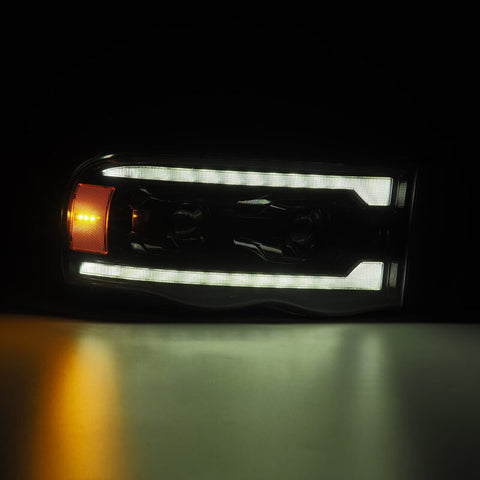 AlphaRex 02-05 Dodge Ram 1500 LUXX LED Proj Headlights Alpha Black w/Activ Light/Seq Signal - 880569