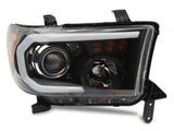 Raxiom 07-13 Toyota Tundra Axial Projector Headlights w/ SEQL LED Bar- Blk Housing (Clear Lens) - TU16007