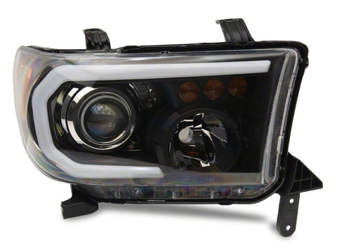 Raxiom 07-13 Toyota Tundra Axial Projector Headlights w/ SEQL LED Bar- Blk Housing (Clear Lens) - TU16007