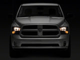 Raxiom 09-18 Dodge RAM 1500 Axial Series Euro Style Headlights w/ Dual Bulb Blk Housing (Clear Lens) - R118016
