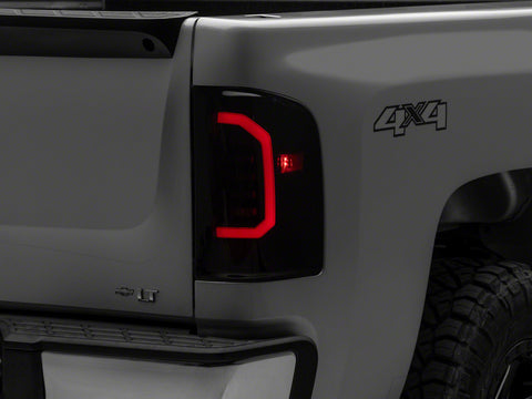 Raxiom 07-14 Chevrolet Silverado 1500 Axial Series LED Tail Lights- Blk Housing (Smoked Lens) - S150366