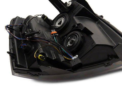 Raxiom 07-13 Chevrolet Silverado 1500 Axial Series Headlights w/ LED Bar- Blk Housing (Clear Lens) - S138003