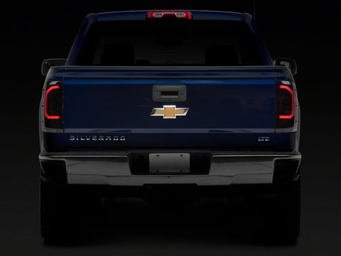 Raxiom 14-18 Chevrolet Silverado 1500 Axial Series LED Tail Lights- Blk Housing (Smoked Lens) - S151298