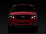 Raxiom 04-08 Ford F-150 Dual LED Halo Projector Headlights- Black Housing (Clear Lens) - T542827