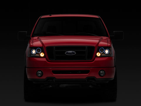 Raxiom 04-08 Ford F-150 Dual LED Halo Projector Headlights- Black Housing (Clear Lens) - T542827