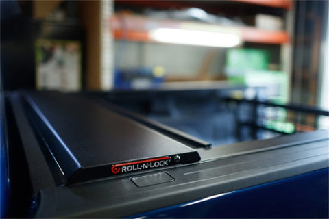 Roll-N-Lock 15-17 Chevy Silverado/Sierra 2500/3500 77-3/8in E-Series Retractable Tonneau Cover - RC221E