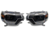 Raxiom 12-15 Toyota Tacoma Axial Series Switchback Projector Headlights- Black Housing- Clear Lens - TT23359