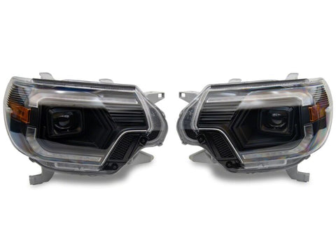 Raxiom 12-15 Toyota Tacoma Axial Series Switchback Projector Headlights- Black Housing- Clear Lens - TT23359