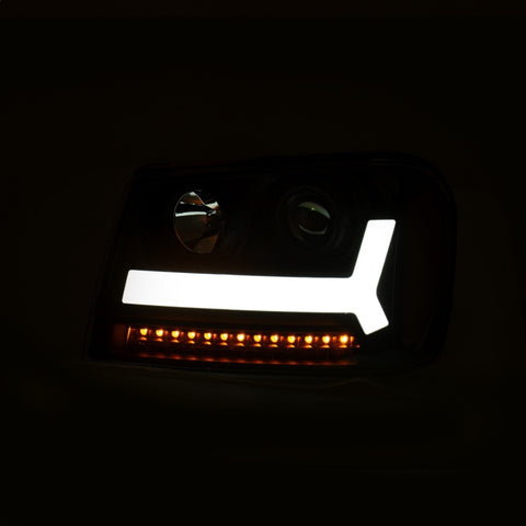 ANZO 2006-2009 Chevrolet Trailblazer Projector Headlights w/ Plank Style Design Black w/ Amber - 111390