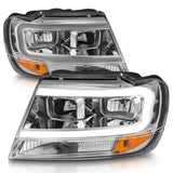 ANZO 1999-2004 Jeep Grand Cherokee Crystal Headlights w/ Light Bar Chrome Housing - 111538
