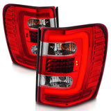 ANZO 1999-2004 Jeep Grand Cherokee LED Tail Lights w/ Light Bar Chrome Housing Red/Clear Lens - 311396