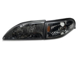 Raxiom 94-98 Mustang Axial Series Cobra Style Headlights- Black Housing (Clear Lens) - 49050
