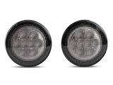 Raxiom 07-18 Jeep Wrangler JK Axial Series LED Amber Turn Signals (Smoked) - J108040