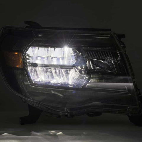 AlphaRex 05-11 Toyota Tacoma LUXX Crystal Headlights Plank Style Alpha Black w/Activation Light/DRL - 880733