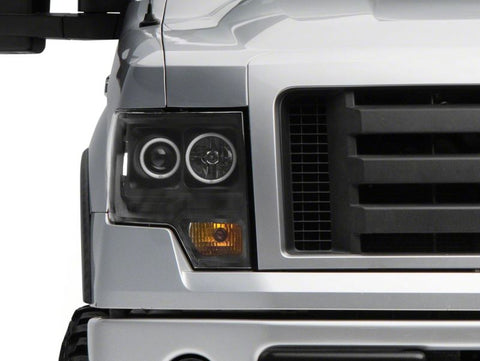 Raxiom 09-14 Ford F-150 Super White LED Halo Projector Headlights- Blk Housing (Clear Lens) - T542825