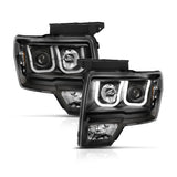 ANZO 2009-2014 Ford F-150 Projector Headlights w/ U-Bar Switchback Black w/ Amber - 111383