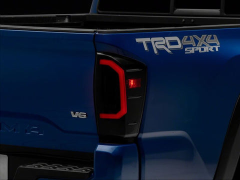 Raxiom 16-23 Toyota Tacoma Axial Series LED Tail Lights- Black Housing- Smoked Lens - TT36288