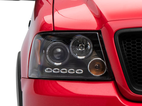 Raxiom 04-08 Ford F-150 Dual LED Halo Projector Headlights- Black Housing (Clear Lens) - T542827