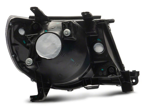 Raxiom 05-11 Toyota Tacoma Axial Series OE Replacement Headlights- Blk Housing (Clear Lens) - TT26260