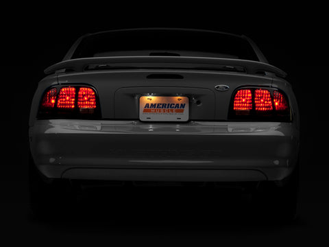 Raxiom 96-98 Ford Mustang Tail Lights- Black Housing (Smoked Lens) - 49124