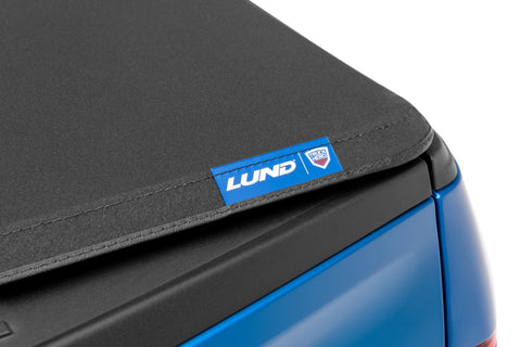 Lund 04-14 Ford F-150 (5.5ft. Bed) Genesis Elite Tri-Fold Tonneau Cover - Black - 95872