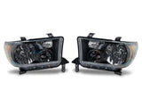 Raxiom 07-13 Toyota Tundra OEM Style Headlights- Black Housing- Clear Lens - TU31281